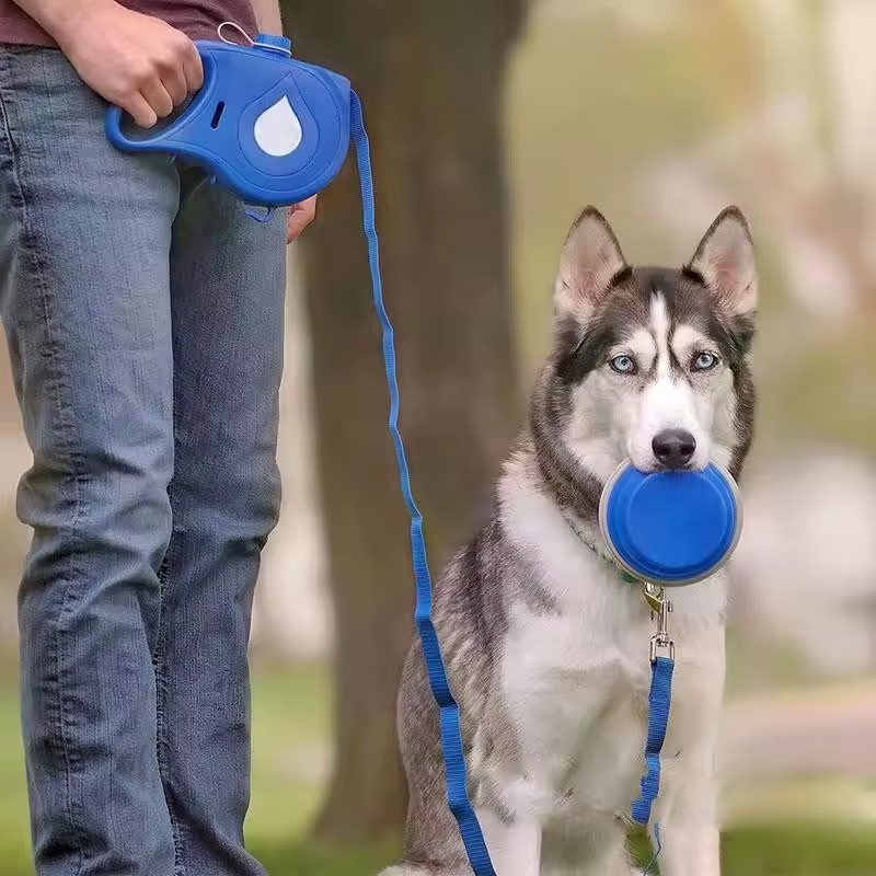 4-in-1 Retractable Dog Leash with Water Bottle, Foldable Bowl & Waste Bag Dispenser, 360° Swivel Non-slip Handle